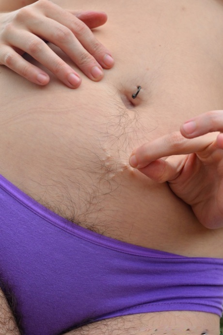 Curvy amateur slut Harley Hex strips and exposes her hairy body in a field
