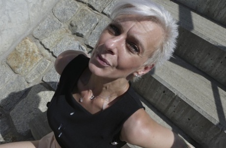 Czech granny Belinda Bee enjoys outdoor doggystyle sex while standing