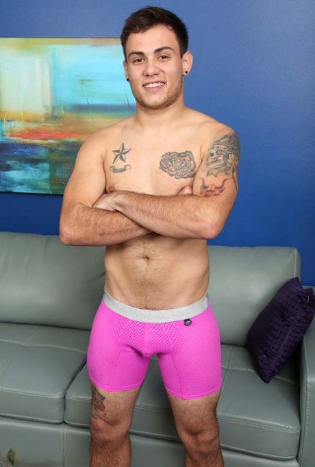 Cute tattooed twink Rhyce strips naked & displays his hard penis & hairy booty