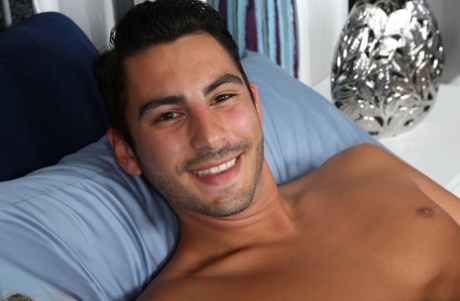 Cute gay Ricky Roberts doffs his shirt and pants to show his prick and ass