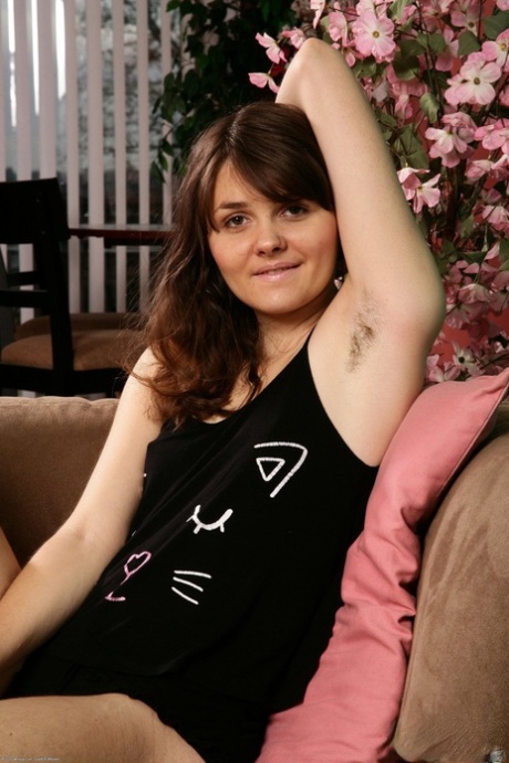 Brunette amateur Briar Rose exposes her hairy pussy and poses naked
