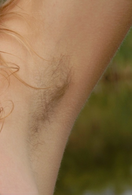 Sweet amateur teen Susie unveils her hairy armpits and coochie by the river