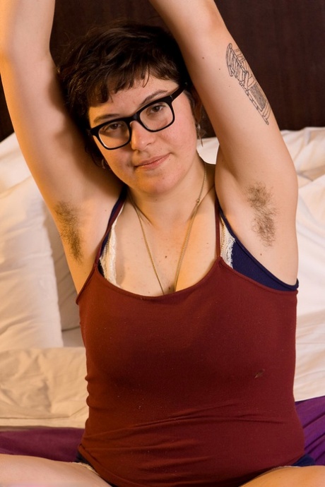 Chubby bombshell Ester shows off her juicy melons & her very hairy pussy