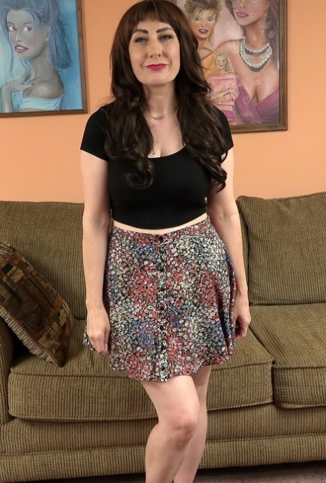 Hot MILF with big tits Melody Mynx strips fully naked & gives a POV blowjob
