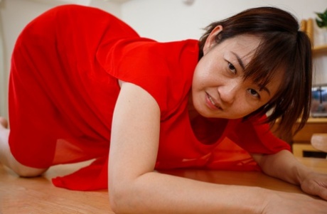 Japanese mom Yuki Kozakura posing in her red dress and panties in a solo