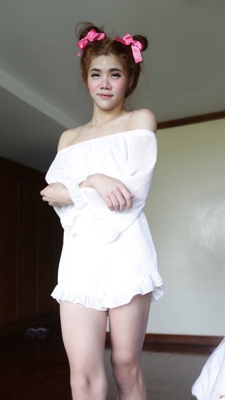 Shy Asian ladyboy Ami strips her white dress, shows her tiny dick & gives a BJ