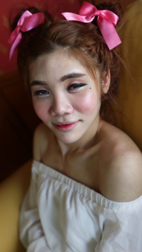 Shy Asian ladyboy Ami strips her white dress, shows her tiny dick & gives a BJ