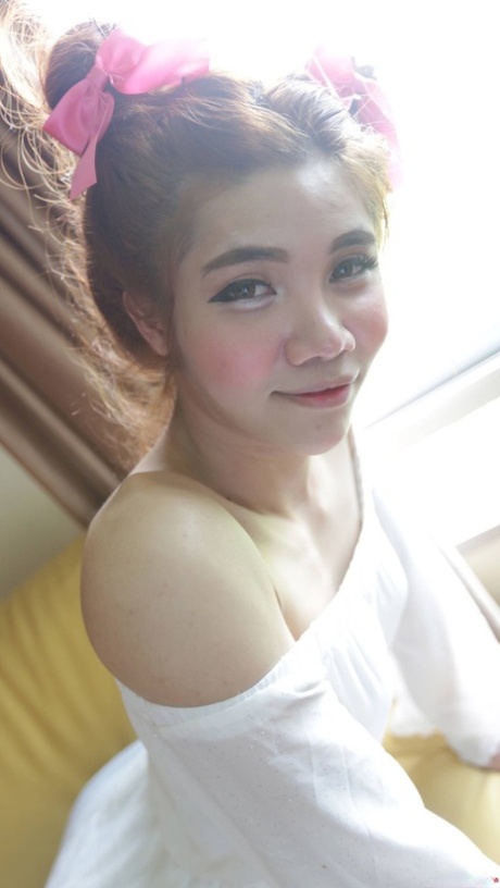 Shy Asian ladyboy Ami strips her white dress, shows her tiny dick & gives a BJ