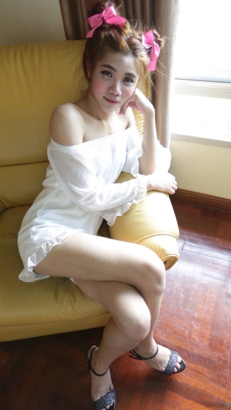 Shy Asian ladyboy Ami strips her white dress, shows her tiny dick & gives a BJ