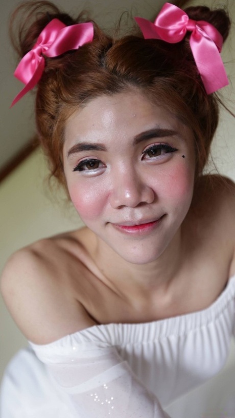 Shy Asian ladyboy Ami strips her white dress, shows her tiny dick & gives a BJ