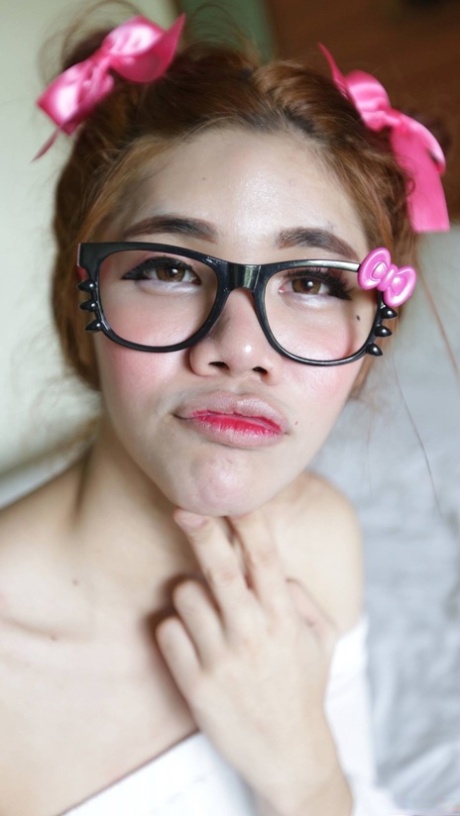 Shy Asian ladyboy Ami strips her white dress, shows her tiny dick & gives a BJ