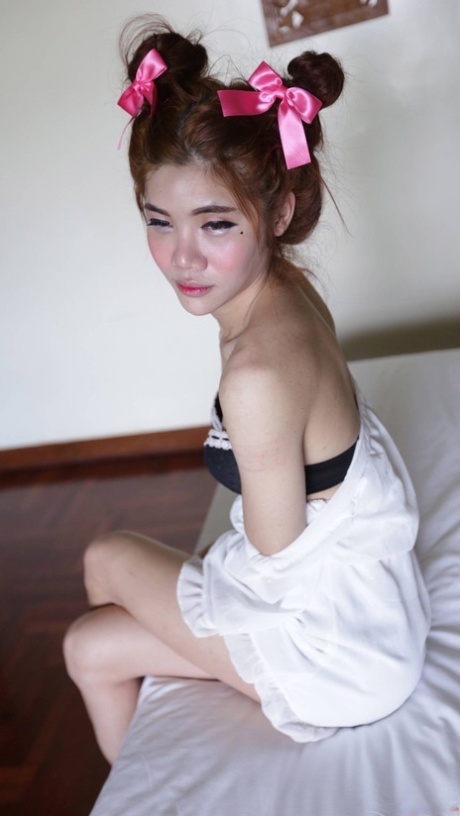 Shy Asian ladyboy Ami strips her white dress, shows her tiny dick & gives a BJ