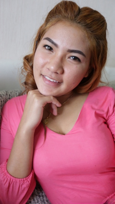 Pretty Asian babe Pat B shows her hairy pussy after a sexy striptease