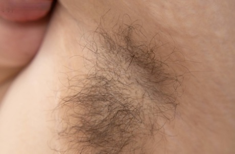 Chubby babe Scarlette strips & shows her hairy pussy up close on her bed