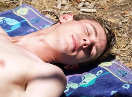 Sexy skinny twink Rick D flaunts his rock hard dick and hairy asshole outdoors
