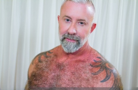 Gay hunk Brian Bonds enjoys hardcore anal sex with hung daddy Lance Charger
